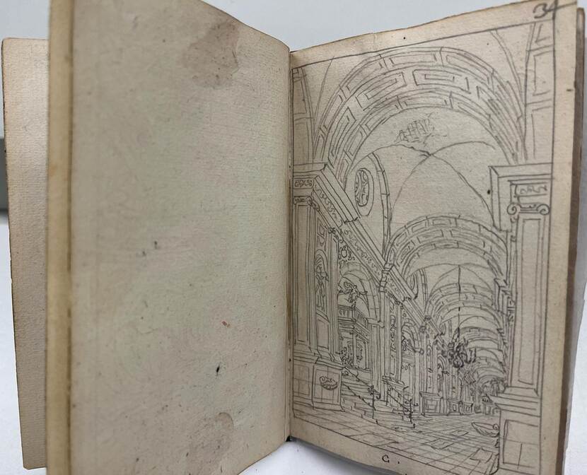 Het Tekenboekje van Daniel de Blieck, opengeslagen op blz 34 met een kerkinterieur